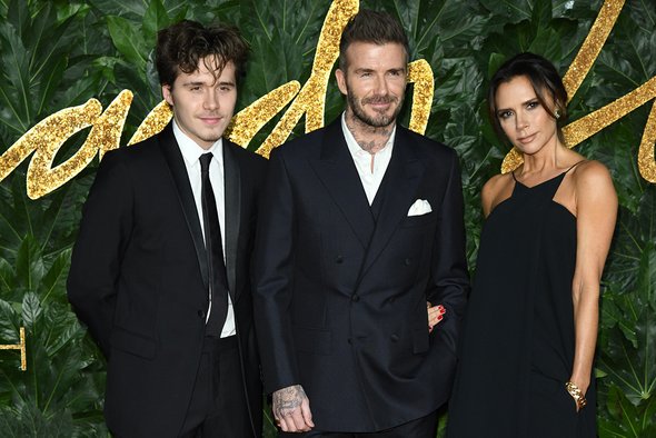 Дэвид и Виктория Бэкхем с сыном Бруклином. Конфликт в семье Бэкхемов